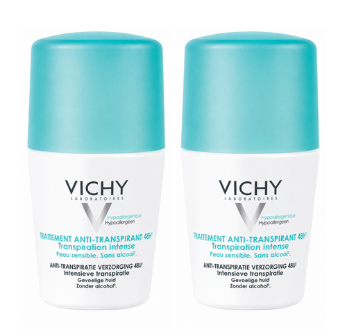 Two Vichy anti-perspirant bottles on a white background